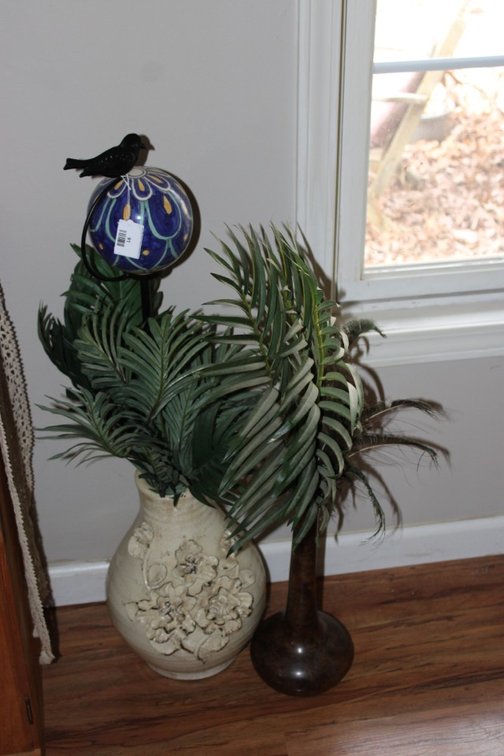 Metal Vase And A Stoneware Vase With Artificial Plants And A Gazing Ball