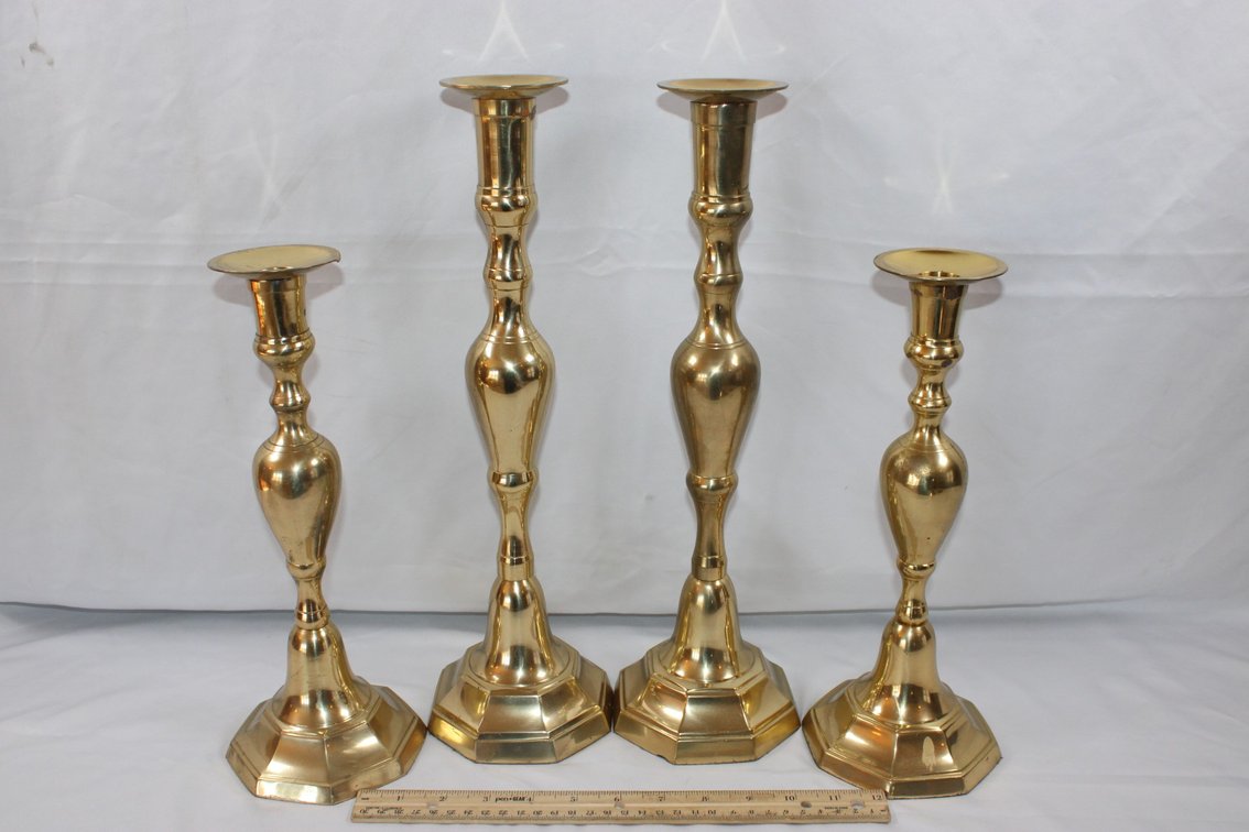 Four Brass Candlesticks, Two At 16 Inches And Two At 12 Inches