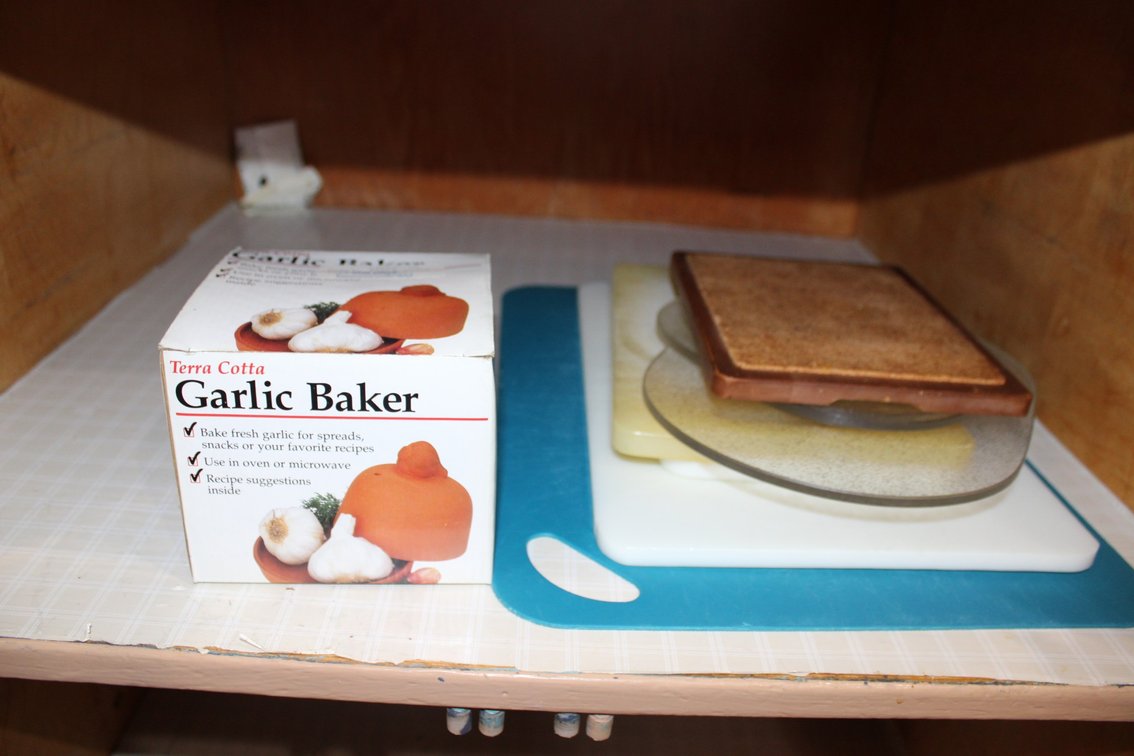 Cutting Boards And Terracotta Garlic Baker