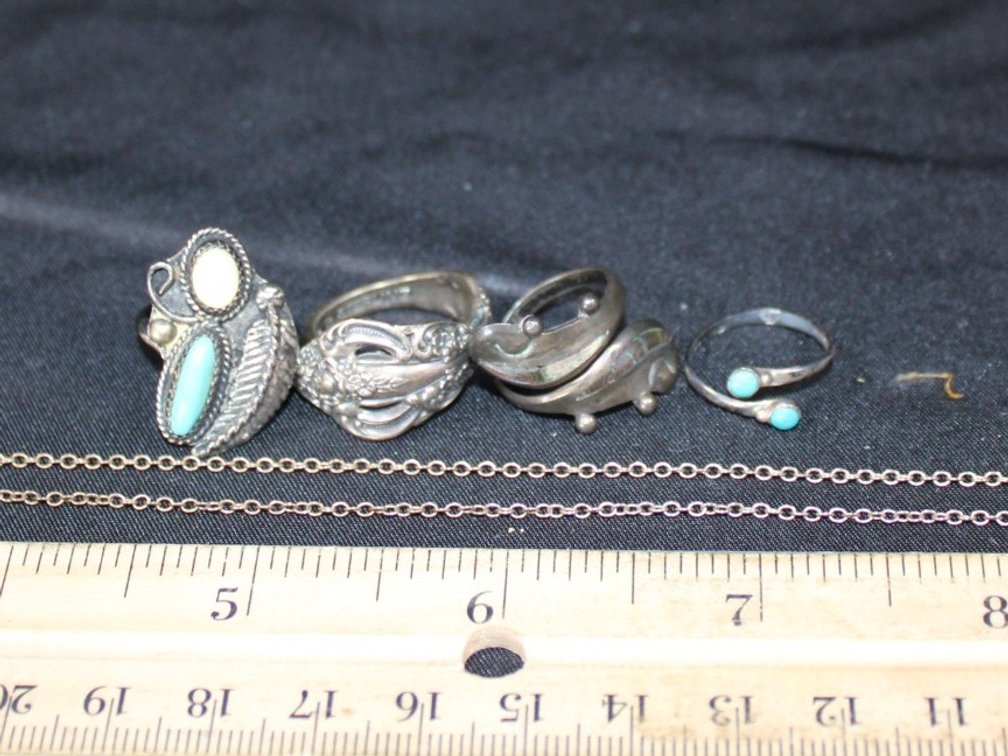 Rings And Necklace. All Marked Sterling Or 925. Total Weight 16.2 Grams. Three Rings Are Adjustable Size, And One's A Size 5