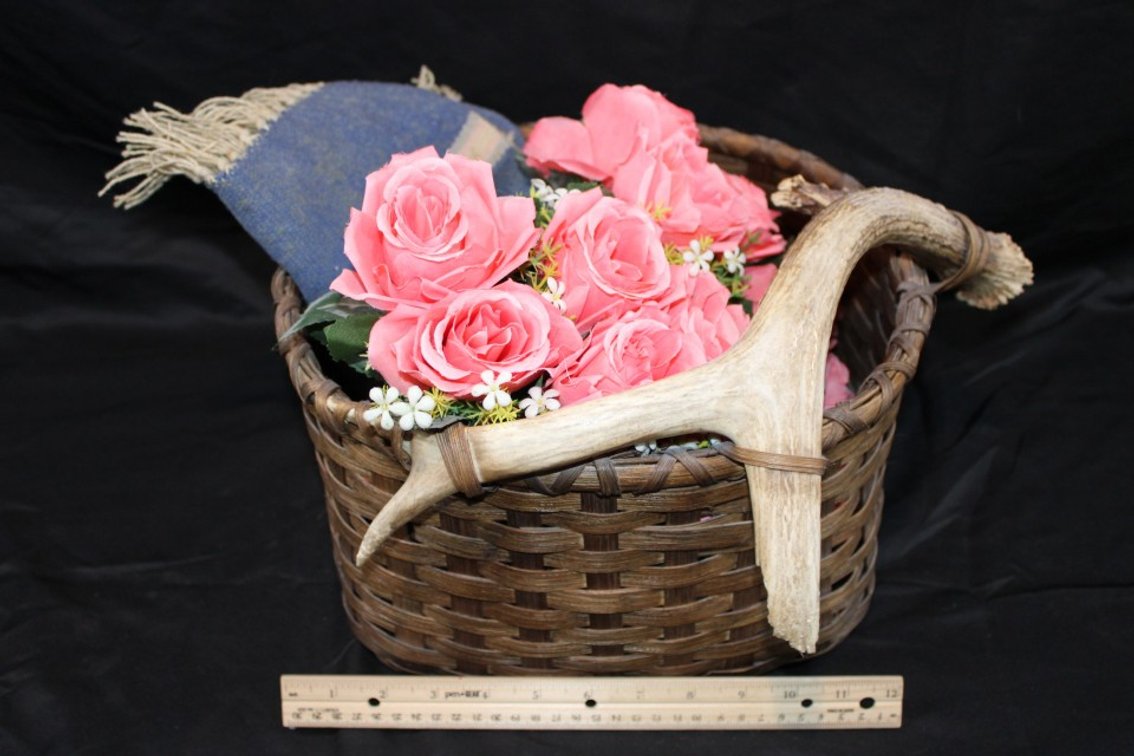 Basket Decorated With Antler, Artificial Roses, And Hand-Woven Rug Miniature