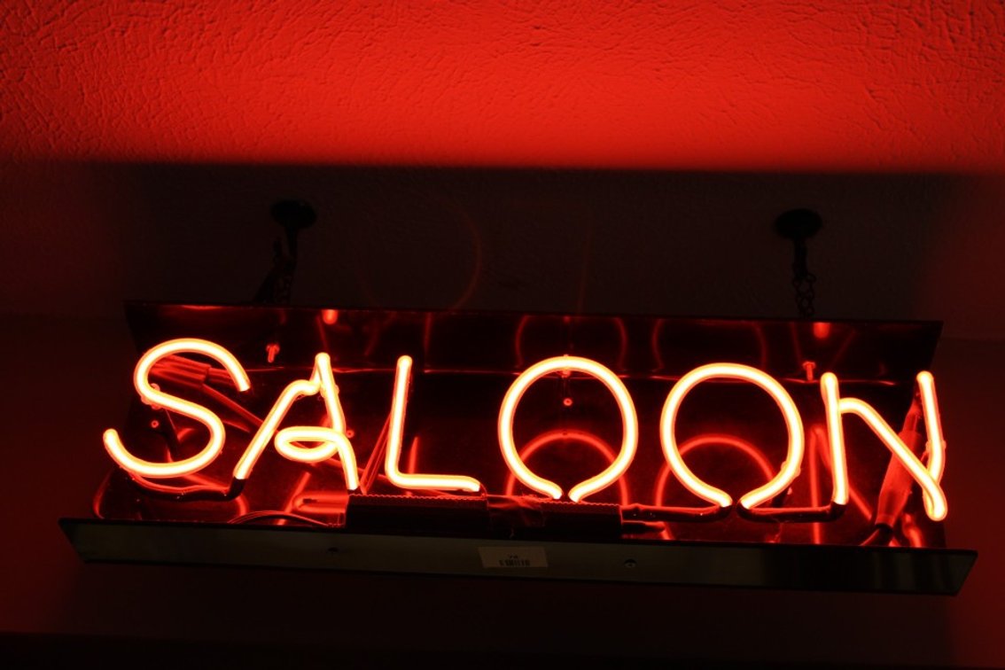 Neon Saloon Sign, Works, Measures 24 x 8.