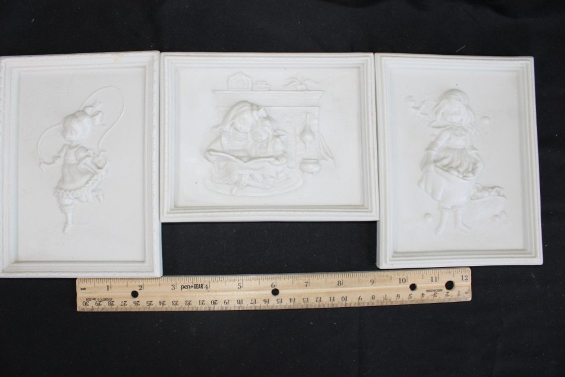 Three Children Wall Plaques.