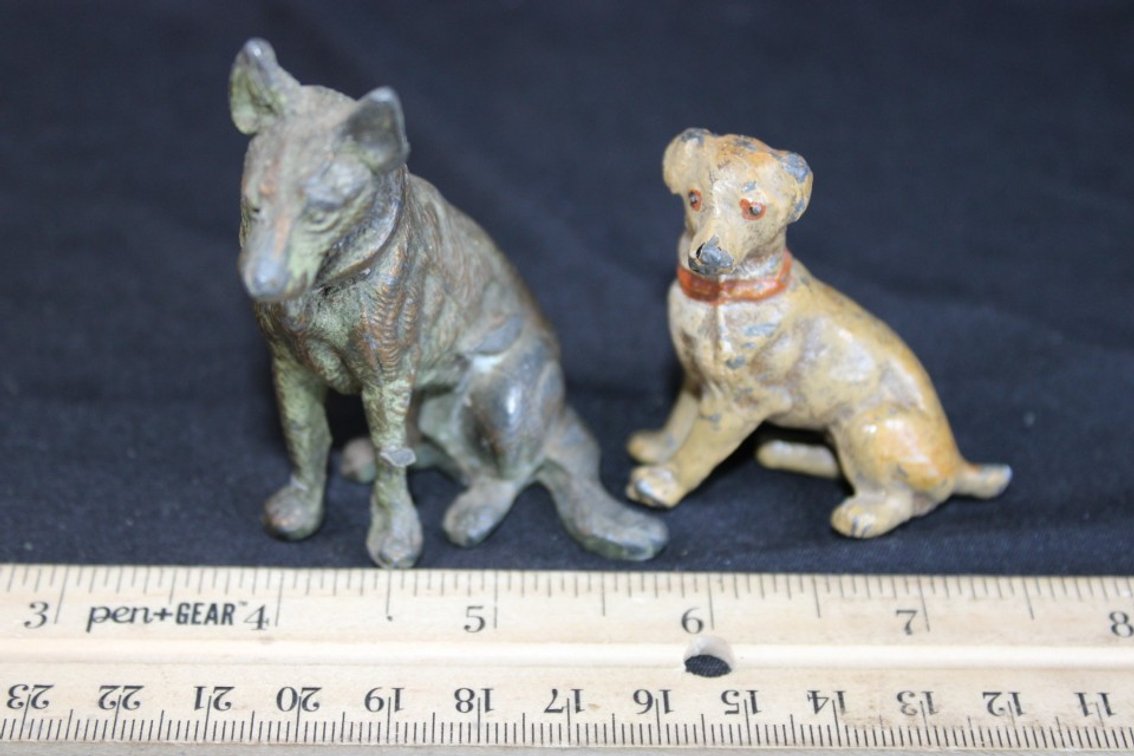 Two Cast Iron Figurines.
