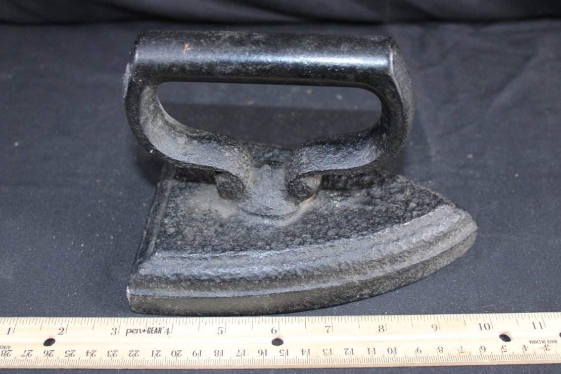 Sad Iron.