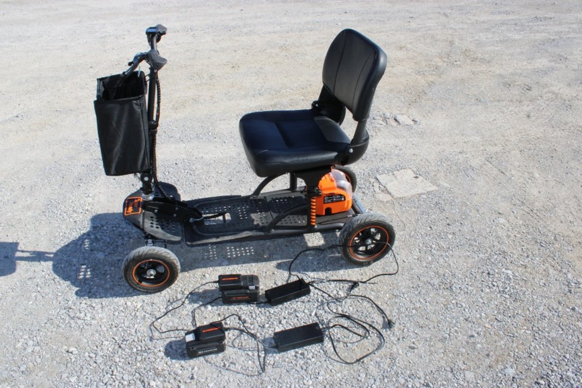 SuperHandy Electric Mobility Scooter. Has Four Batteries And Two Chargers