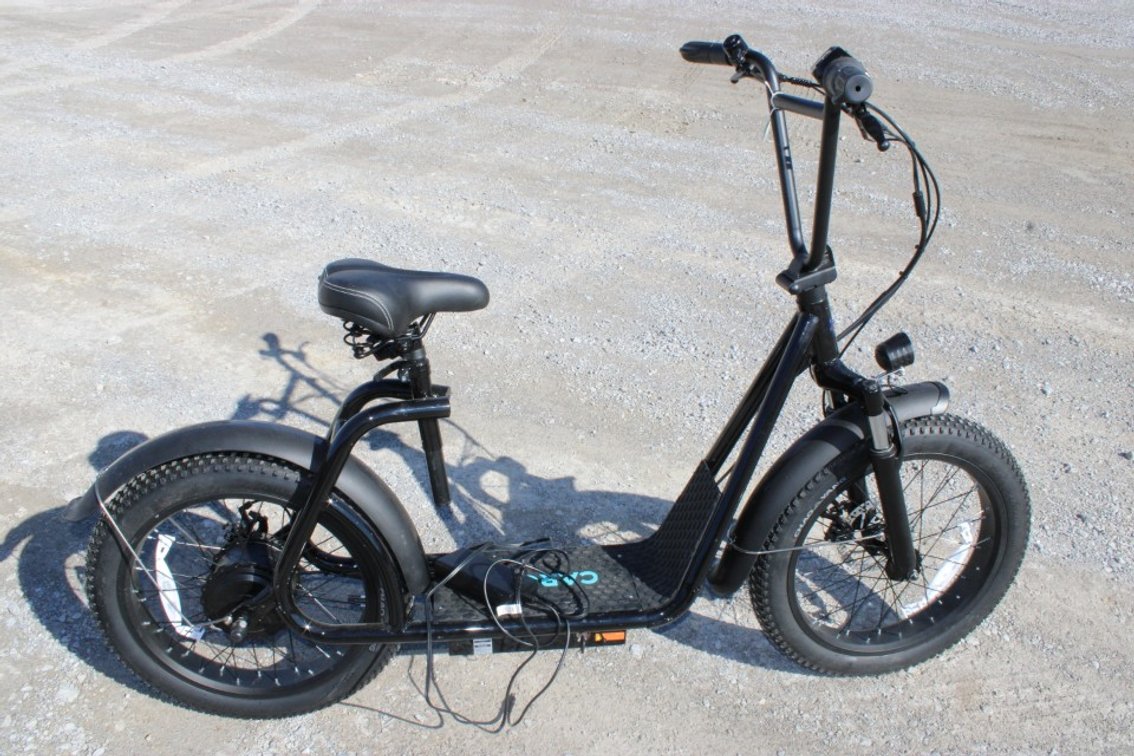 Kroma Power Scooter Has Battery Charger And Key.