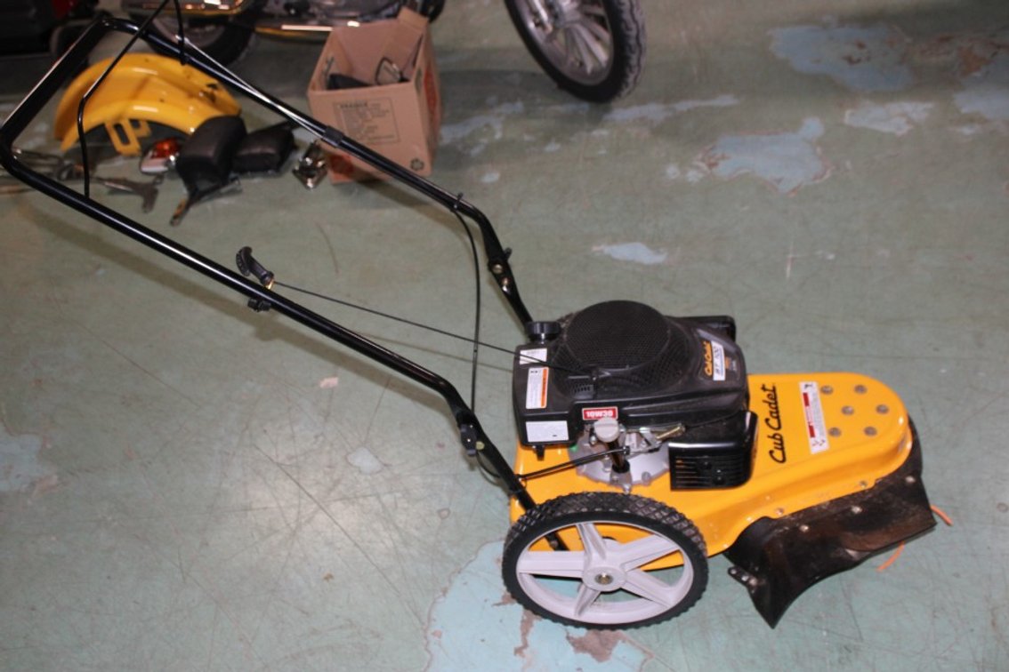 Cub Cadet, Model St100 Walk Behind Trimmer.