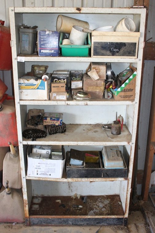 Metal Shelf With Filters And Implement Parts