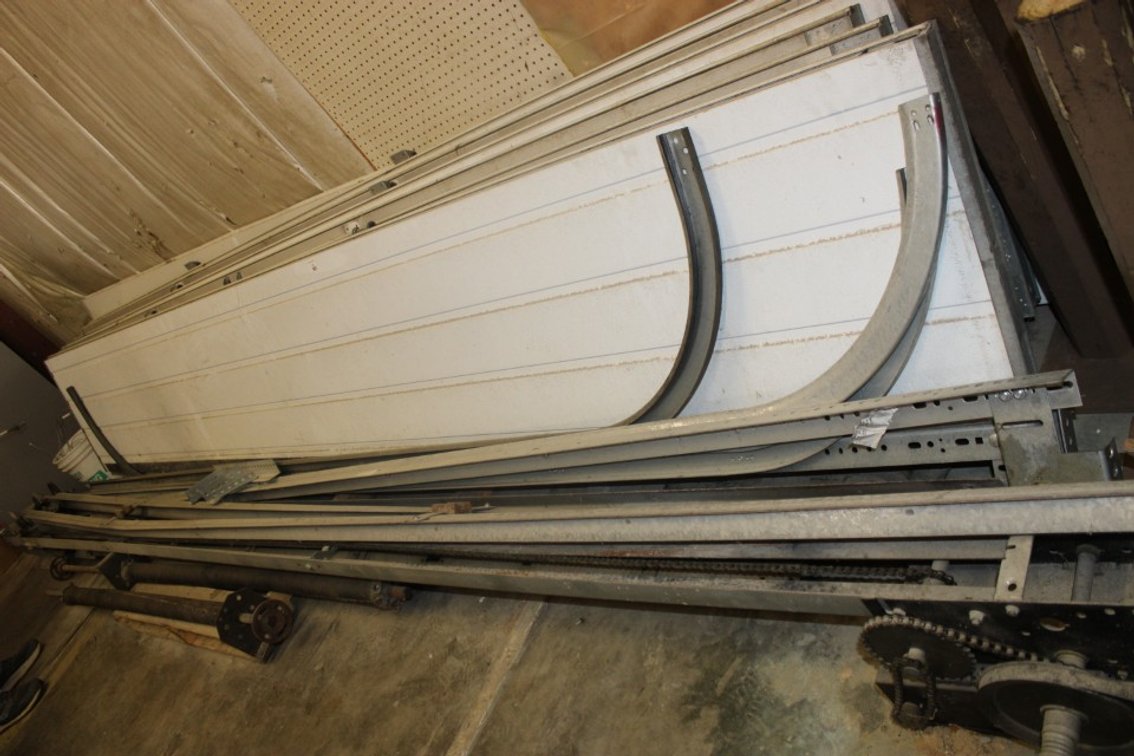 Garage Door Track and Opener, Some Track in Loft, Requiring a Ladder, 7 Panels Measuring 170 x 27, Condition Unknown. All Hardware Not Guaranteed.