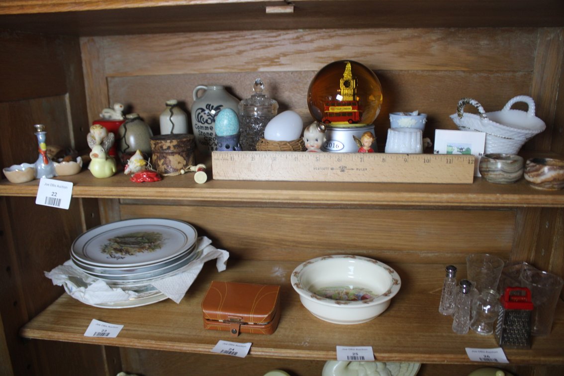 Commemorative Stoneware Crock Marked Hook, N. York, 1867, With Assorted Stoneware Bottles, Ceramic Egg Cups, A Bisque Kewpie-Style Doll And Praying Angel Figurine, London Big Ben Snow Globe, Milk Glass Basket And Vases, Wooden Pyrography Box, Wax