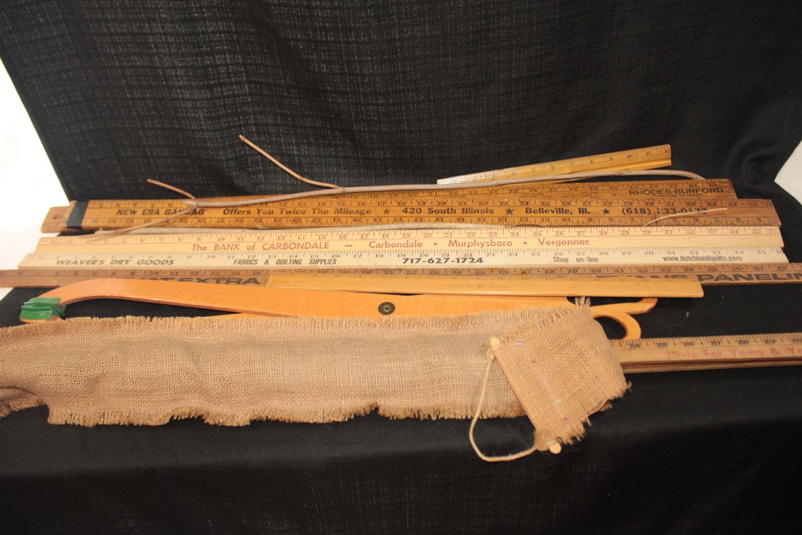 Various Yardsticks, Big Scissor Grabber, And Yardstick And A Half, Including Rhodes Buford Furniture Credit And New Era Bandag