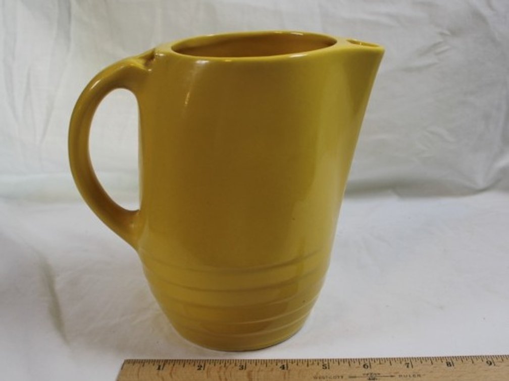 Fiesta Yellow Pitcher Approximately 7 Inches Tall