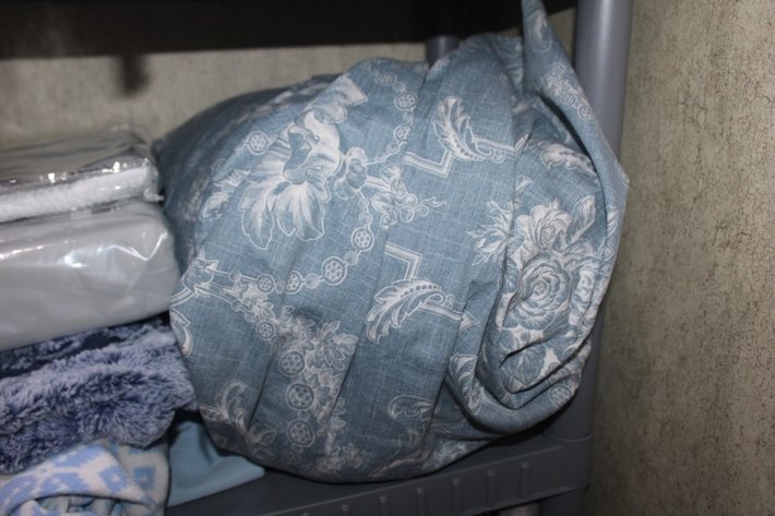 Image for Bedding and Plastic Organizer Shelf