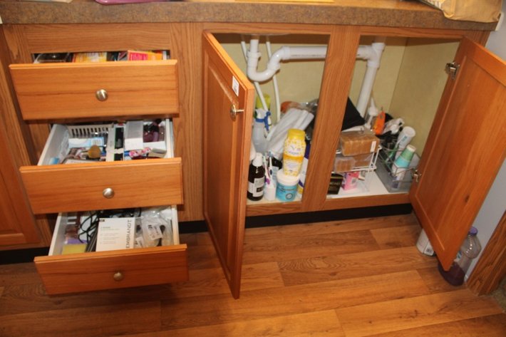 Image for Contents of Under Sink Cabinets and Drawers to Include Personal Care Items, Cleaning Supplies, Etc...