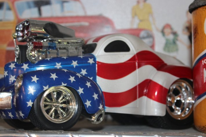 Image for Model Gas Pumps, Oil Can Stash Containers, a Master Mechanic's Willys Coupe Hot Rod, and a Tin Ford Sign