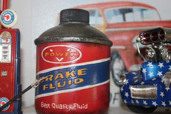 Image for Model Gas Pumps, Oil Can Stash Containers, a Master Mechanic's Willys Coupe Hot Rod, and a Tin Ford Sign