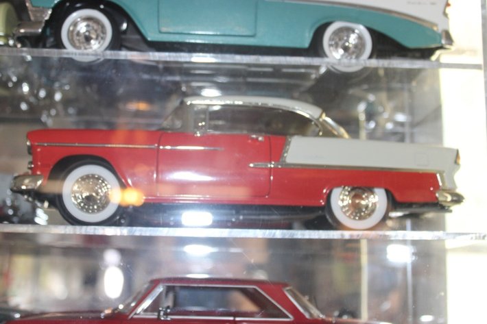 Image for Plexiglas Die Cast Display Shelf with 12 1:18 Scale Models Including Sunstar 1963 Nova, 1960 Chevy Impala, Ertl 1955 Chevy Bel Air, Precision 1956 Chevy Bel Air, Ertl 1958 Chevy Impala, Signature 1956 Chevy Bel Air, 1959 Impala, Sun Star 1953 Bel Air