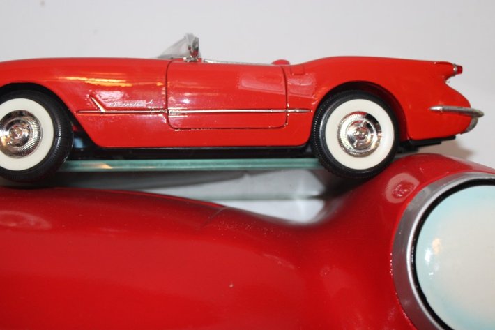 Image for 1957 Corvette Display Shelf with Two 1:18 Scale Diecast Including 1957 Corvette with a Loose Windshield and Two Loose Wheels, and a 1954 Corvette by Mira, Display Shelf Measures 20 x 6 x 9