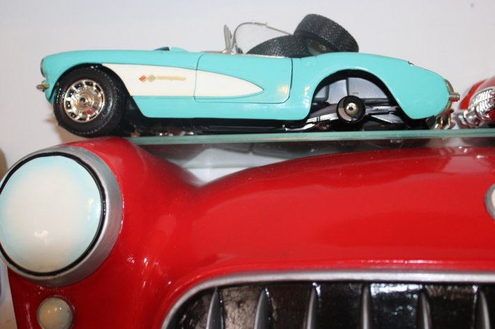 Image for 1957 Corvette Display Shelf with Two 1:18 Scale Diecast Including 1957 Corvette with a Loose Windshield and Two Loose Wheels, and a 1954 Corvette by Mira, Display Shelf Measures 20 x 6 x 9