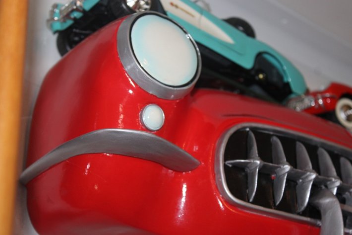 Image for 1957 Corvette Display Shelf with Two 1:18 Scale Diecast Including 1957 Corvette with a Loose Windshield and Two Loose Wheels, and a 1954 Corvette by Mira, Display Shelf Measures 20 x 6 x 9