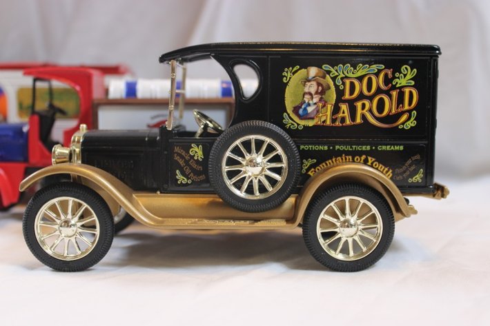 Image for Five 1:24 Scale Diecast Advertising Cars: Tractor Supply 1918 Runabout, Union 76 1912 Delivery Car Christmas Delivery Bank, Ertl 1913 Model T Van Mobil Oil, Ertl Kenworth Truck, and Doc Arnold Ertl 1923 Delivery Van Coin Bank