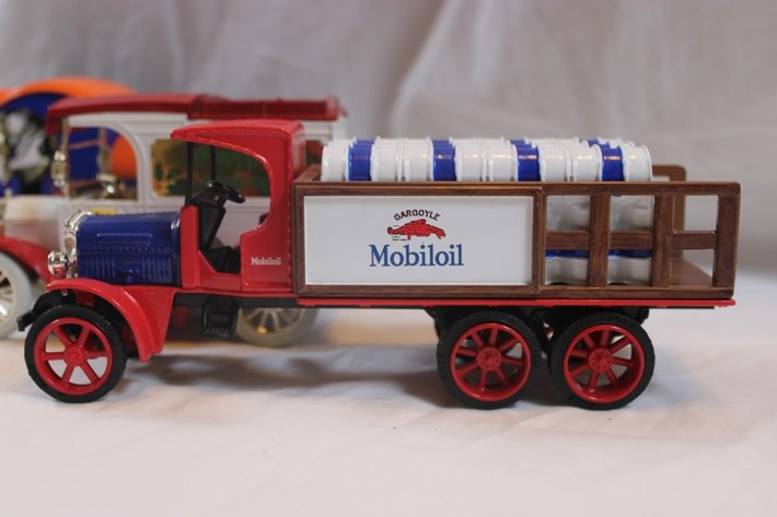 Image for Five 1:24 Scale Diecast Advertising Cars: Tractor Supply 1918 Runabout, Union 76 1912 Delivery Car Christmas Delivery Bank, Ertl 1913 Model T Van Mobil Oil, Ertl Kenworth Truck, and Doc Arnold Ertl 1923 Delivery Van Coin Bank