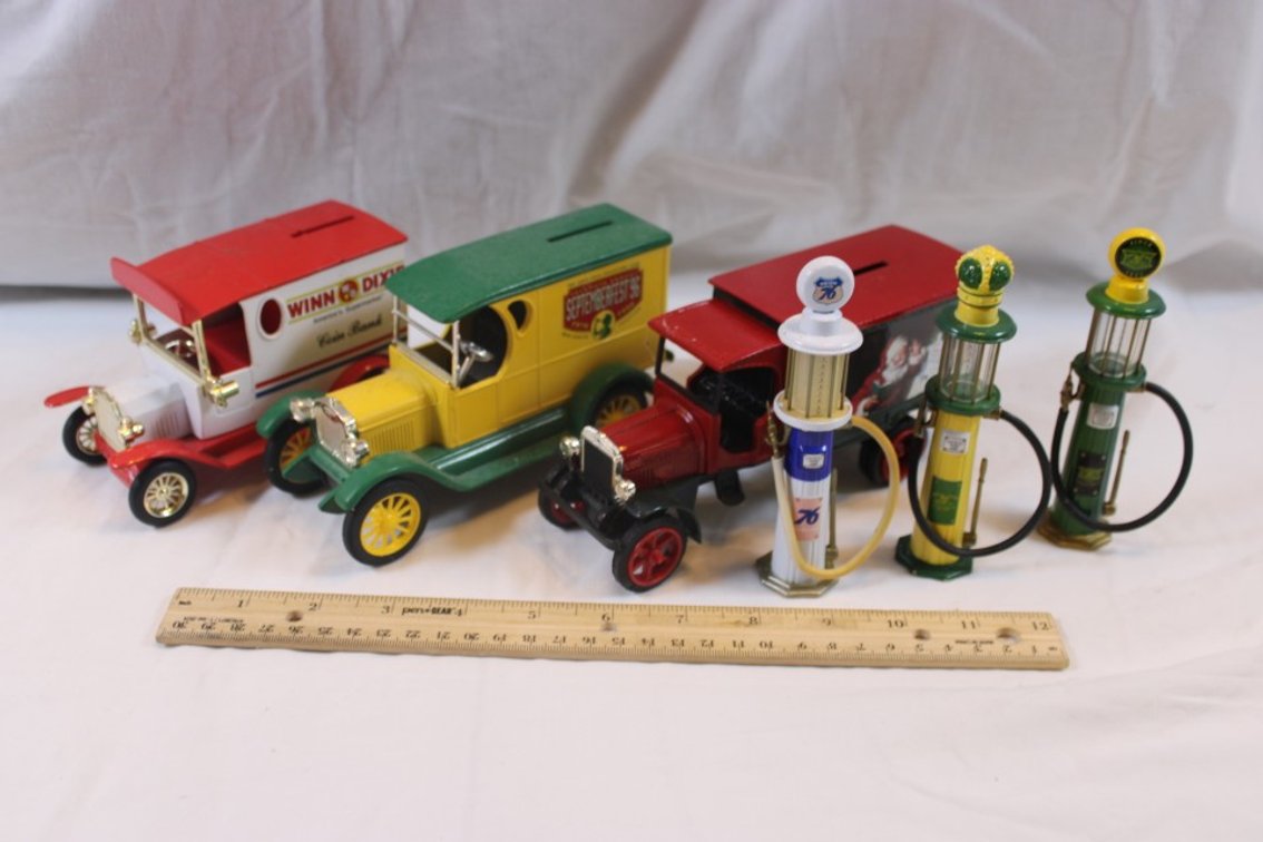 Three 1:24 Scale Cast Iron Banks and Miniature Gas Pumps: Winn-Dixie Golden, Coca-Cola September Fest '96 Ertl 1923 Delivery Van, and Coca-Cola Ertl Kenworth Delivery