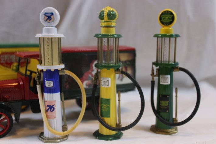 Image for Three 1:24 Scale Cast Iron Banks and Miniature Gas Pumps: Winn-Dixie Golden, Coca-Cola September Fest '96 Ertl 1923 Delivery Van, and Coca-Cola Ertl Kenworth Delivery