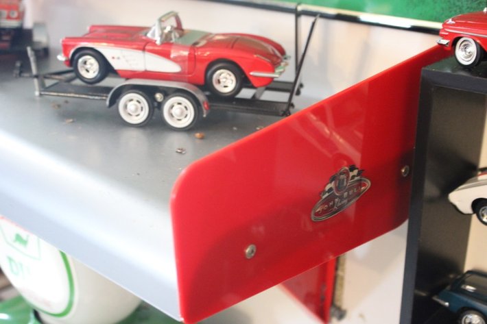 Image for Display Shelf with Two 1:24 Scale Models on Trailers: 1974 AMC Gremlin X and '59 Corvette. Shelf Measures 24 x 11.5 x 11.5