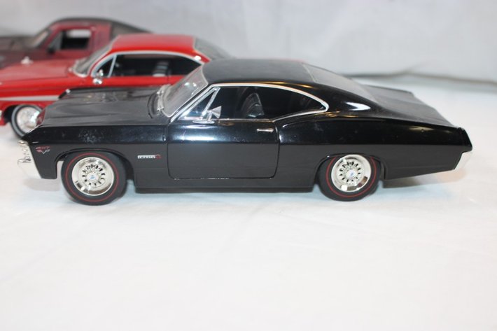 Image for Four 1:24 Scale Diecast Models: Jada 1968 Chevy Corvette Stingray Coupe, Jada 1967 Chevy Impala SS Cardinals Themed, 1961 Ford Thunderbird, and Classic Metal Works '64 Impala