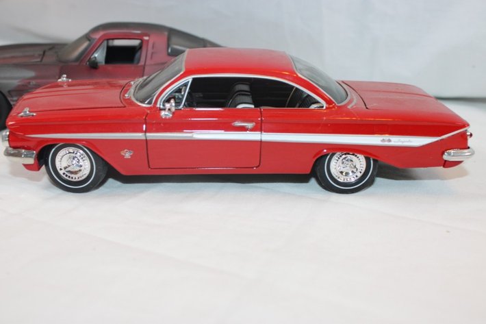 Image for Four 1:24 Scale Diecast Models: Jada 1968 Chevy Corvette Stingray Coupe, Jada 1967 Chevy Impala SS Cardinals Themed, 1961 Ford Thunderbird, and Classic Metal Works '64 Impala