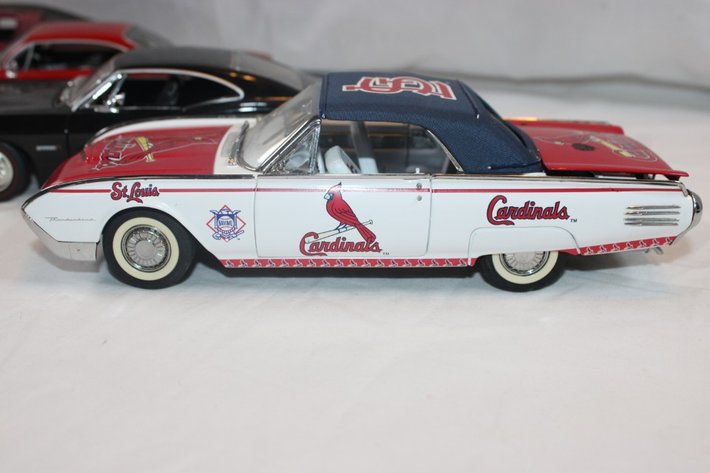 Image for Four 1:24 Scale Diecast Models: Jada 1968 Chevy Corvette Stingray Coupe, Jada 1967 Chevy Impala SS Cardinals Themed, 1961 Ford Thunderbird, and Classic Metal Works '64 Impala