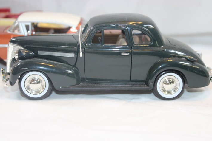 Image for Four 1:24 Scale Diecast Cars: 1939 Chevy Coupe, Classic Metal Works '50s Chevy Impala, Classic Metal Works Mercury Convertible, and Maisto 1950 Chevy 3100