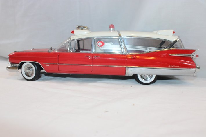 Image for 4 1:18 Scale Cars, MRC Pink Cadillac, Precision 1959 Cadillac Ambulance, 1958 Cadillac, Maisto 1959 Cadillac