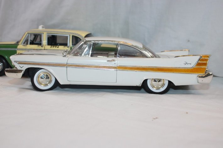 Image for Three Cars, Two 1:18 Scale and One 1:24 Scale, 1957 Plymouth Fury, 1959 AMC Metropolitan, 1961 Checker A11