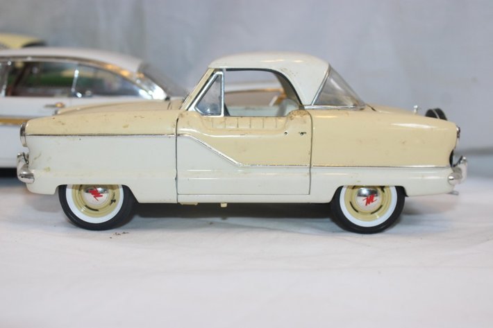 Image for Three Cars, Two 1:18 Scale and One 1:24 Scale, 1957 Plymouth Fury, 1959 AMC Metropolitan, 1961 Checker A11