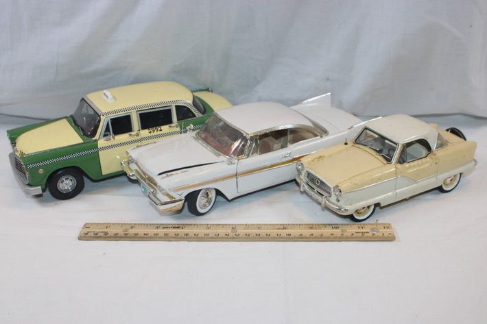 Image for Three Cars, Two 1:18 Scale and One 1:24 Scale, 1957 Plymouth Fury, 1959 AMC Metropolitan, 1961 Checker A11