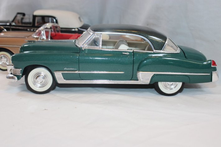 Image for 4 1:18 Scale Cars, Signature 1958 Cadillac, 1949 Cadillac, 1961 Checker Cab, 1938 Cadillac