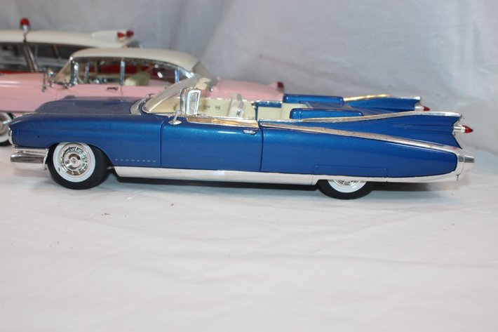 Image for 4 1:18 Scale Cars, MRC Pink Cadillac, Precision 1959 Cadillac Ambulance, 1958 Cadillac, Maisto 1959 Cadillac