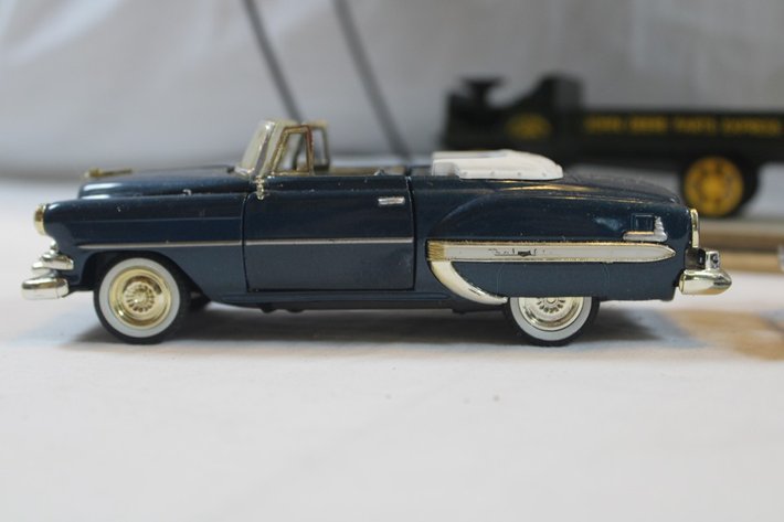 Image for Display Shelf with Five 1:24 Scale Diecast Cars: 1970 Dodge Challenger Motor Max, 1941 Plymouth Truck, 1954 Chevy Bel Air, Liberty Billy Ray Cyrus Limited Edition One of 5000 Ford Model A Delivery Truck Bank