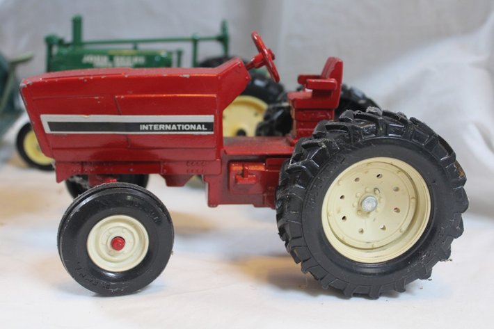 Image for Five Diecast Tractors and a Tin Tractor. One Has a Broken Wheel
