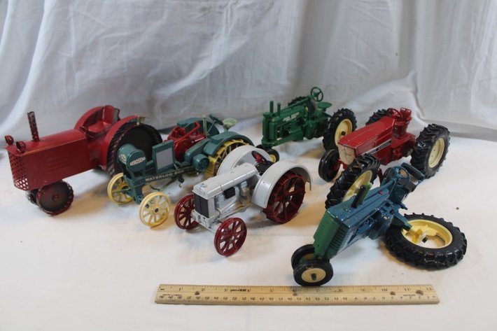 Image for Five Diecast Tractors and a Tin Tractor. One Has a Broken Wheel