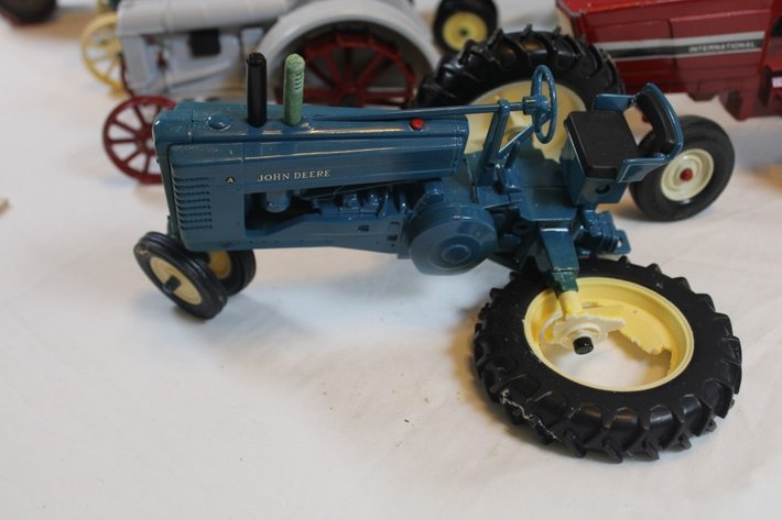 Image for Five Diecast Tractors and a Tin Tractor. One Has a Broken Wheel