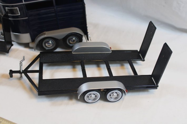 Image for Four Diecast Trailers, One 1:18 Scale Airstream Motor City Classics, One 1:18 Scale Horse Trailer Motor City Classics, and Two Car Haulers