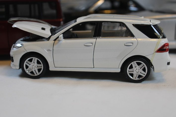 Image for Six Diecast Cars, Plymouth Prowler Maisto, 1:18 Scale Thunderbird, 1:18 Scale Mini Cooper, 1:18 Scale 2000 Chevy SSR, 1:24 Scale Scion xB, and 1:32 Scale Mercedes