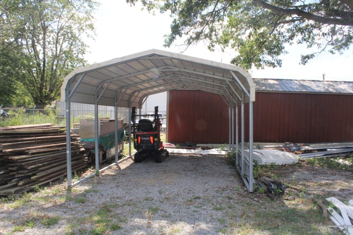20 by 12 Carport, 9 Foot to the Center Peak. One Upright Has a Dent