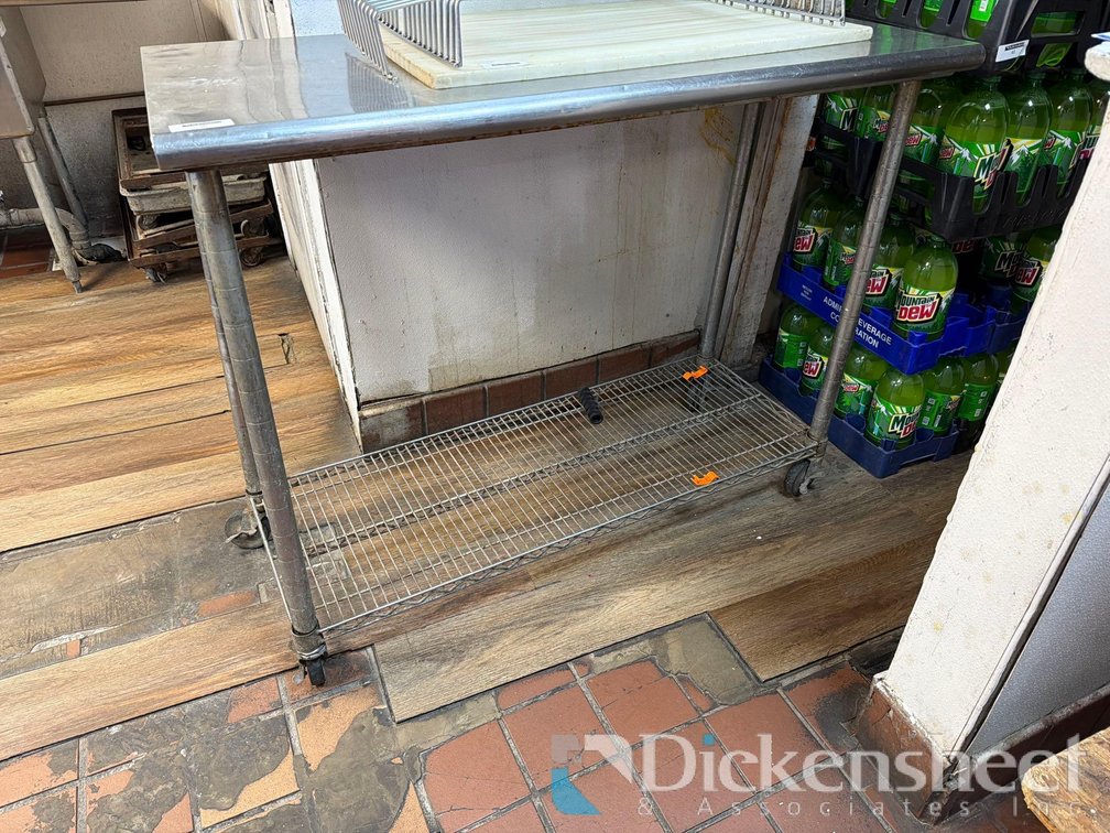 STAINLESS STEEL TABLE WITH LOWER SHELF ON CASTERS