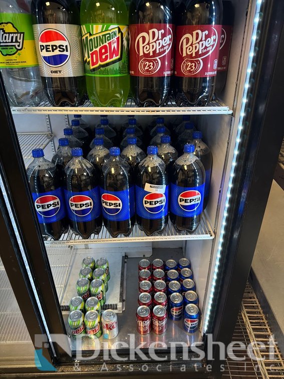 LOT OF BOTTLED AND CANNED SODA LOCATED IN REFRIGERATOR