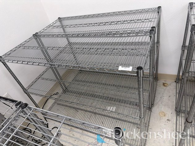 Image for LOT OF (2) WIRE RACKS ON CASTERS